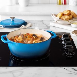 A meal fully cooked inside an Amazon Basics Enameled Cast Iron Covered Round Dutch Oven